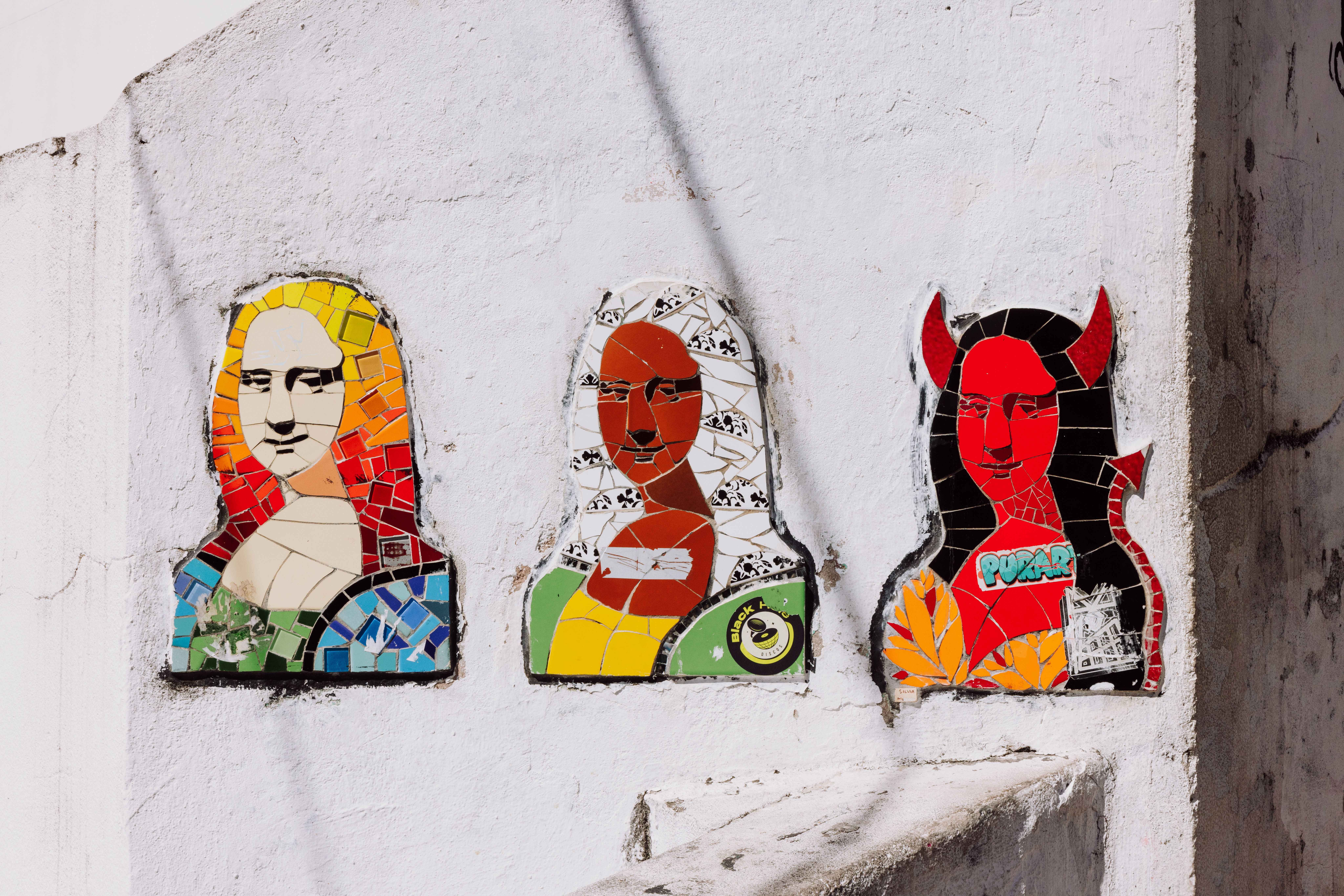 Vibrant mosaic depiction of Mona Lisa on a wall in Rio de Janeiro, Brazil.