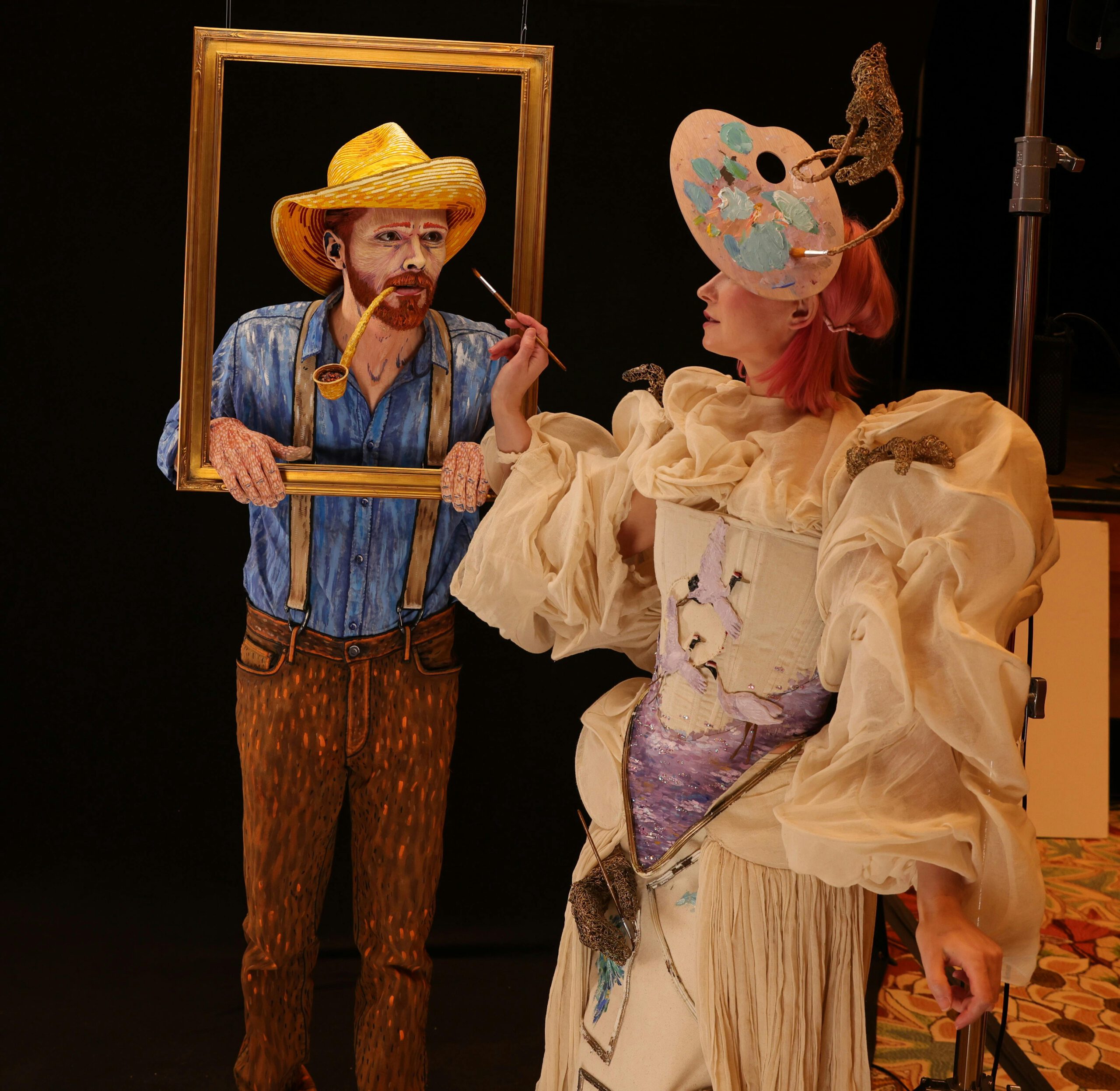 Artistic portrait combining a painting and a person in creative costume. Dynamic view.